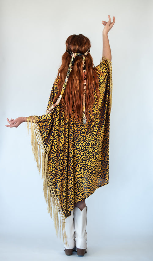 Outfit, fashion, festival fashion, matching set, top, designer clothing, fashion trends, bodysuit, robe, cheetah print robe, cheetah print bodysuit, gold robe